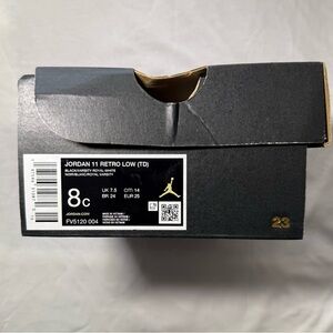 Jordan 11 Retro Low TD Black and Gold